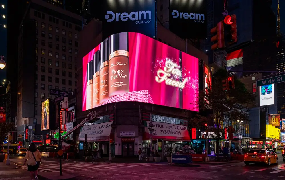 Colorful advertising billboards in Times Square at night